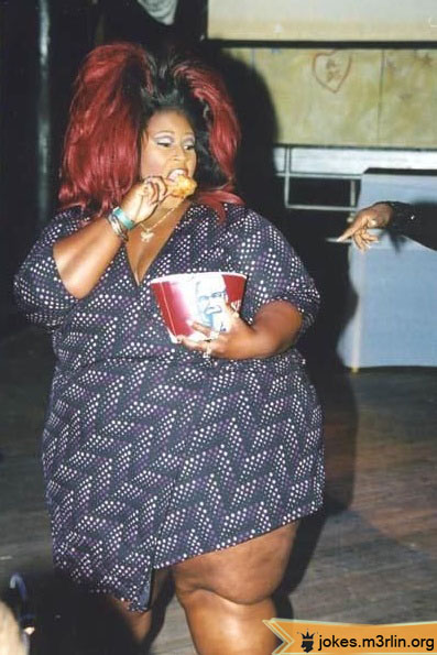 000946-fat-overweight-black-woman-with-huge-red-hair-eating-kfc-chicken